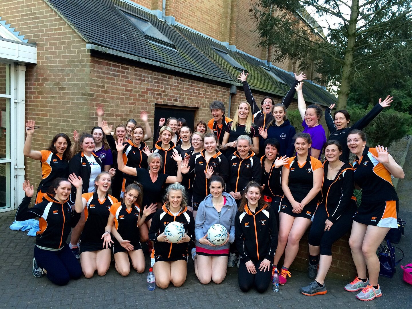 Netball squad photographed together after a match