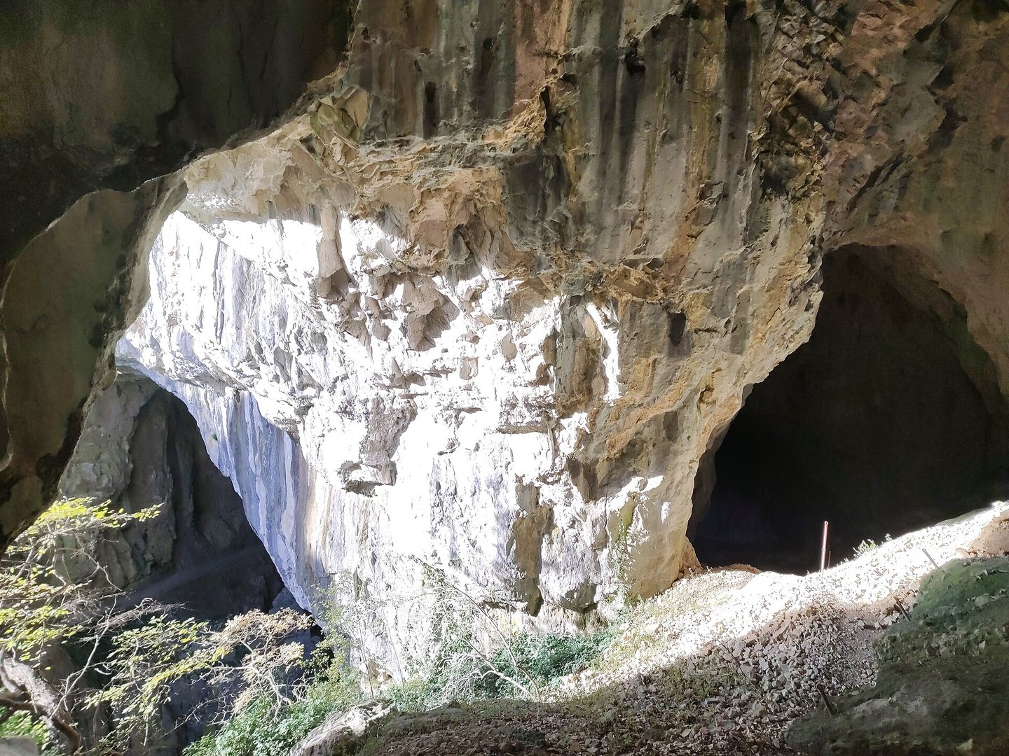 Vast natural cave entrance in the limestone karst at Škocjan, Slovenia